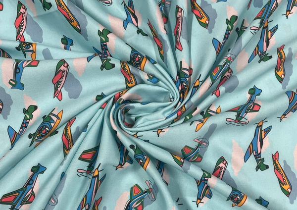 Sky Blue Quirky Printed Swiss Cotton Fabric
