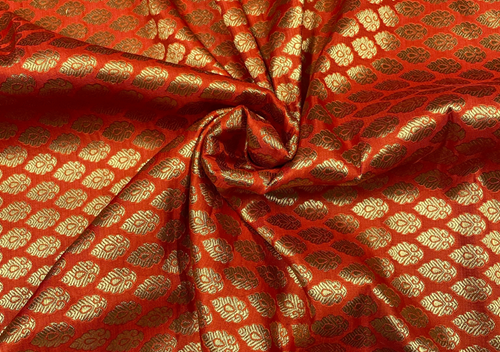 Orange & Golden Motifs Semi Brocade Viscose Fabric