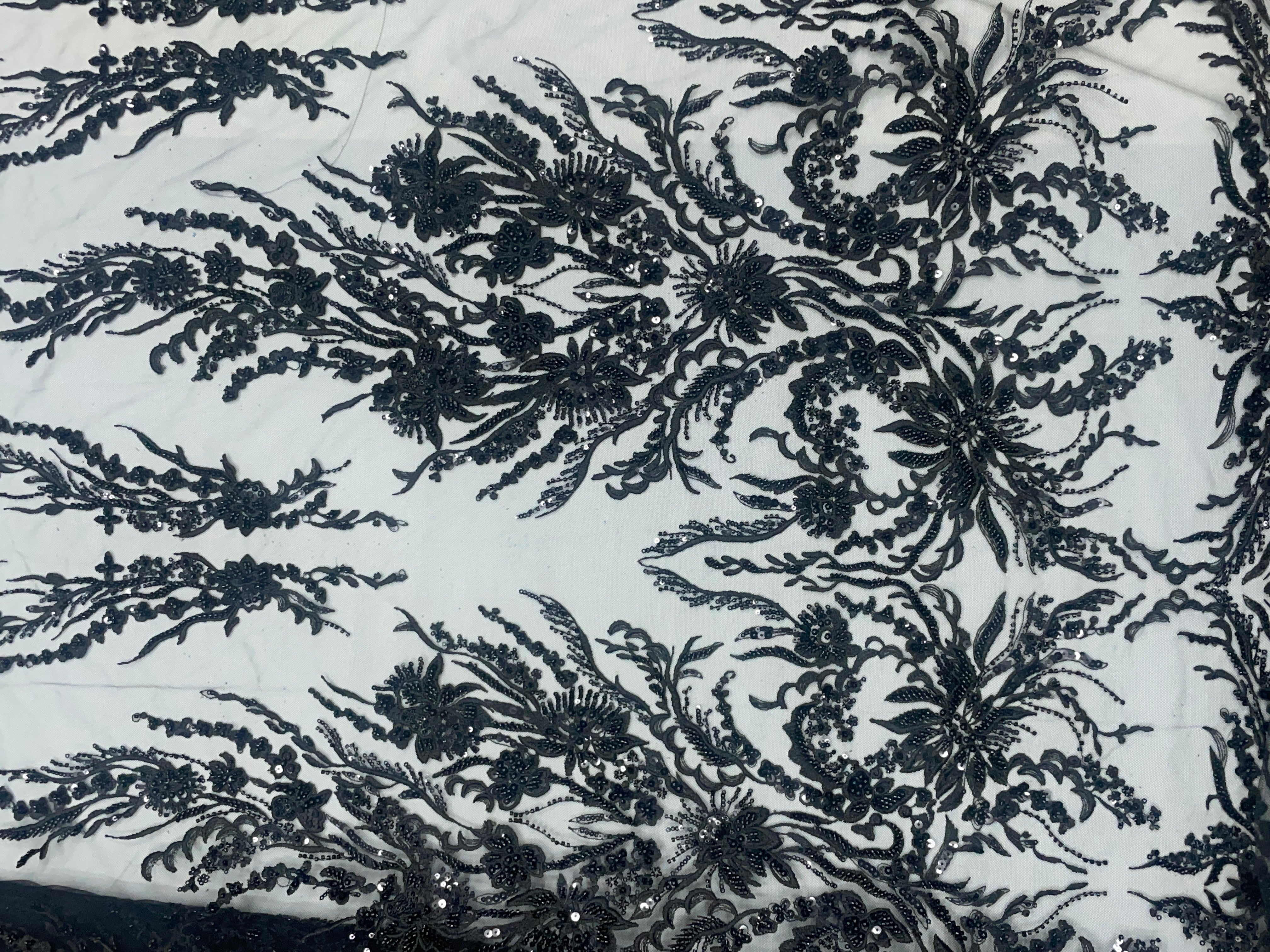 Top Floral Embroidered fabrics in India