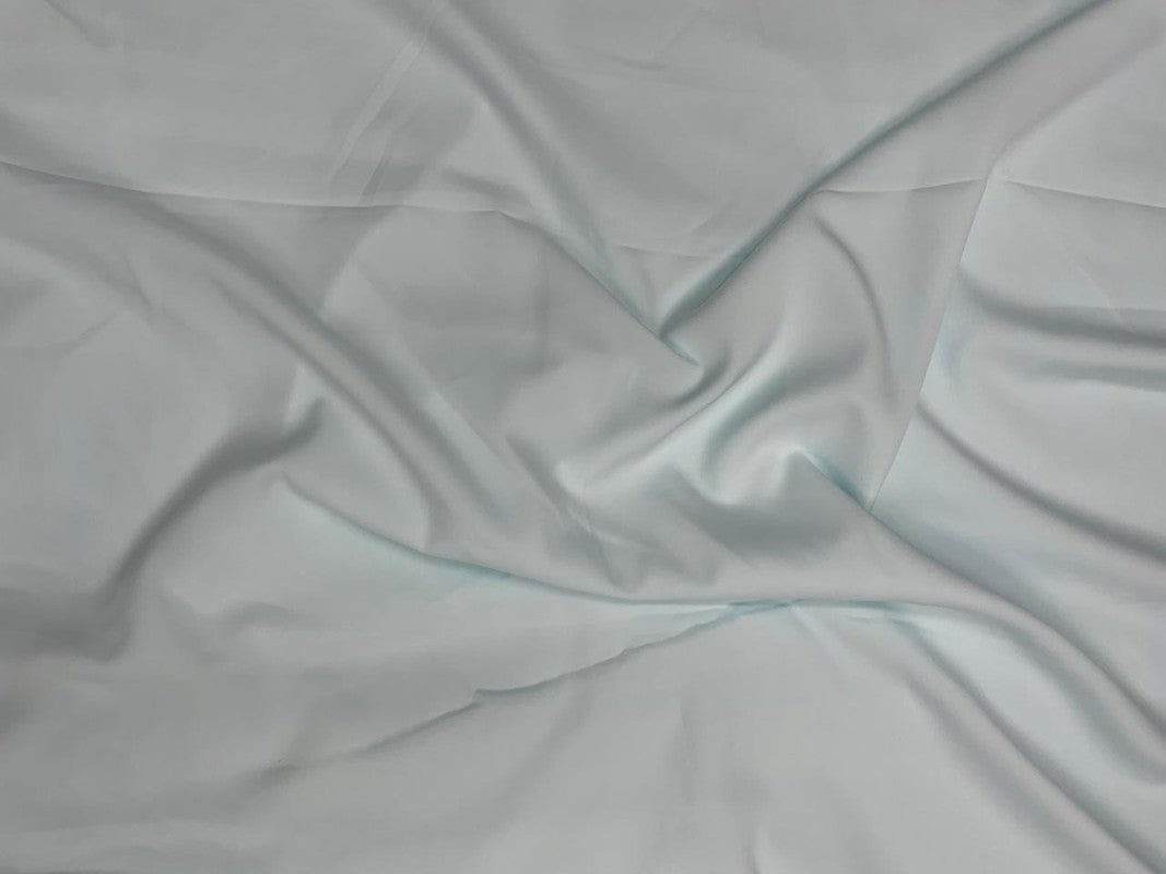 Ice Blue Plain Dyed Poly Crepe (Per Meter - Rs 44 )