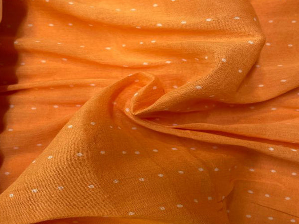 Orange Printed Cotton Mul Fabric